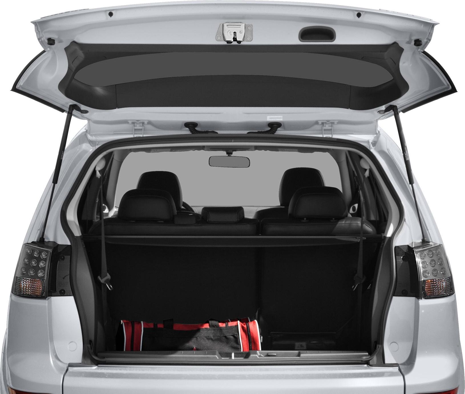 Open rear trunk with visible storage and rear seats