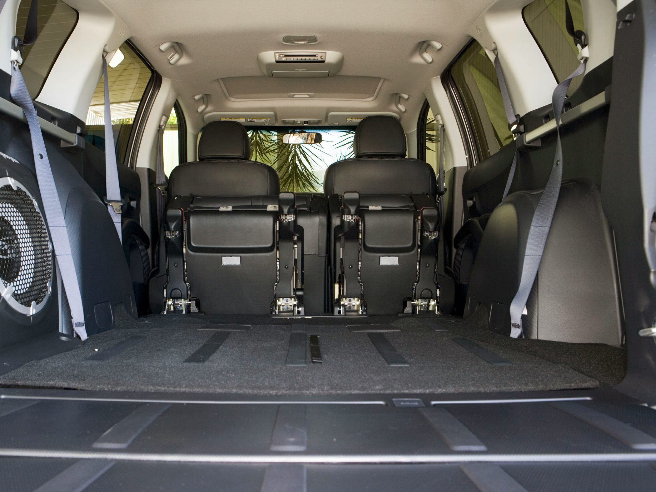 Spacious cargo area with folded rear seats in SUV interior
