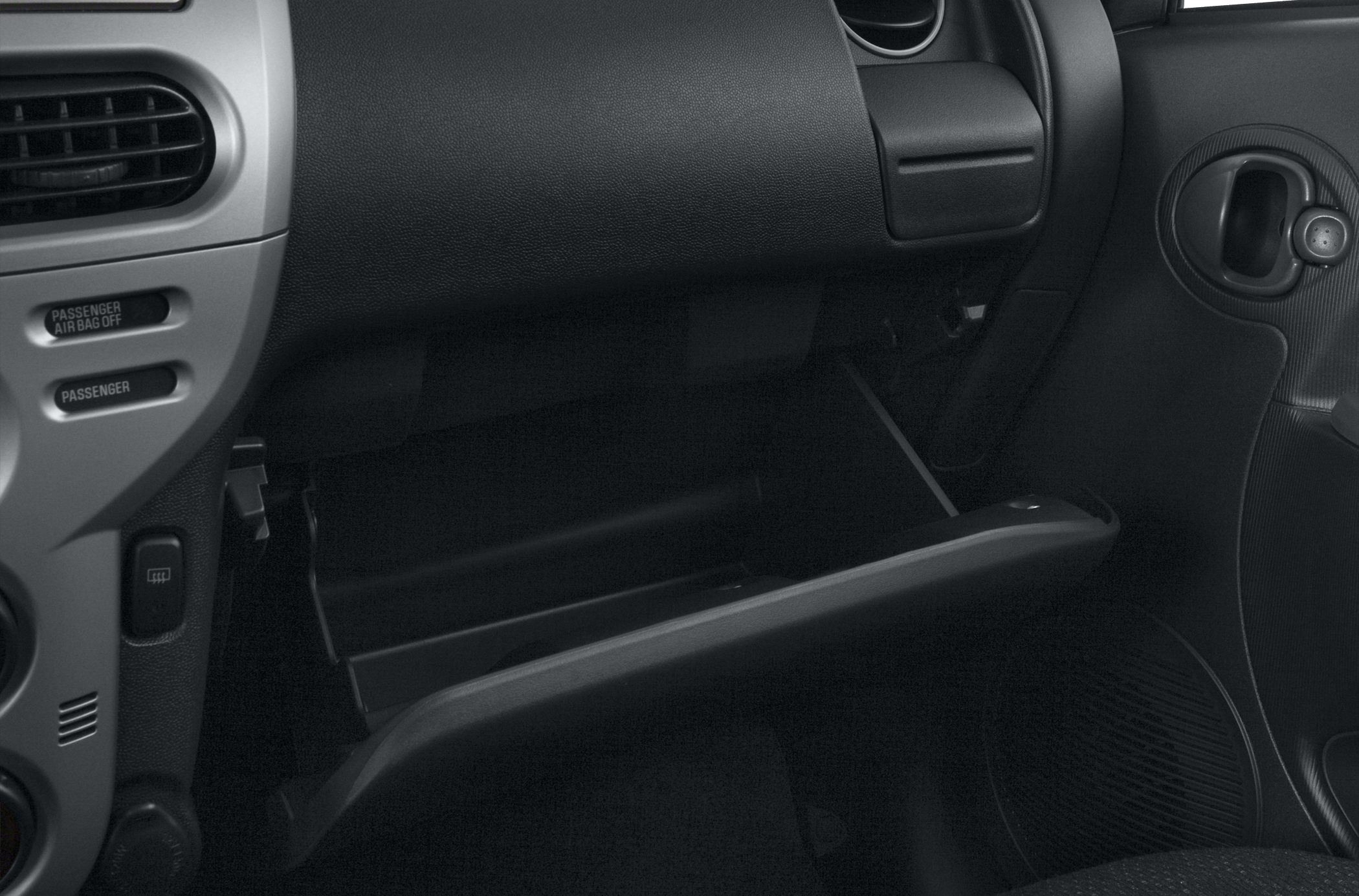 Open glove compartment and dashboard storage area