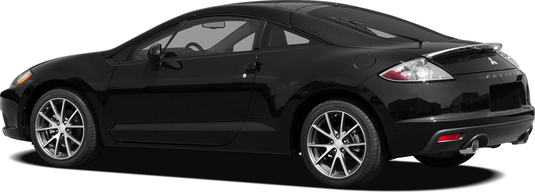 Rear side view of a sleek two-door sports coupe with alloy wheels