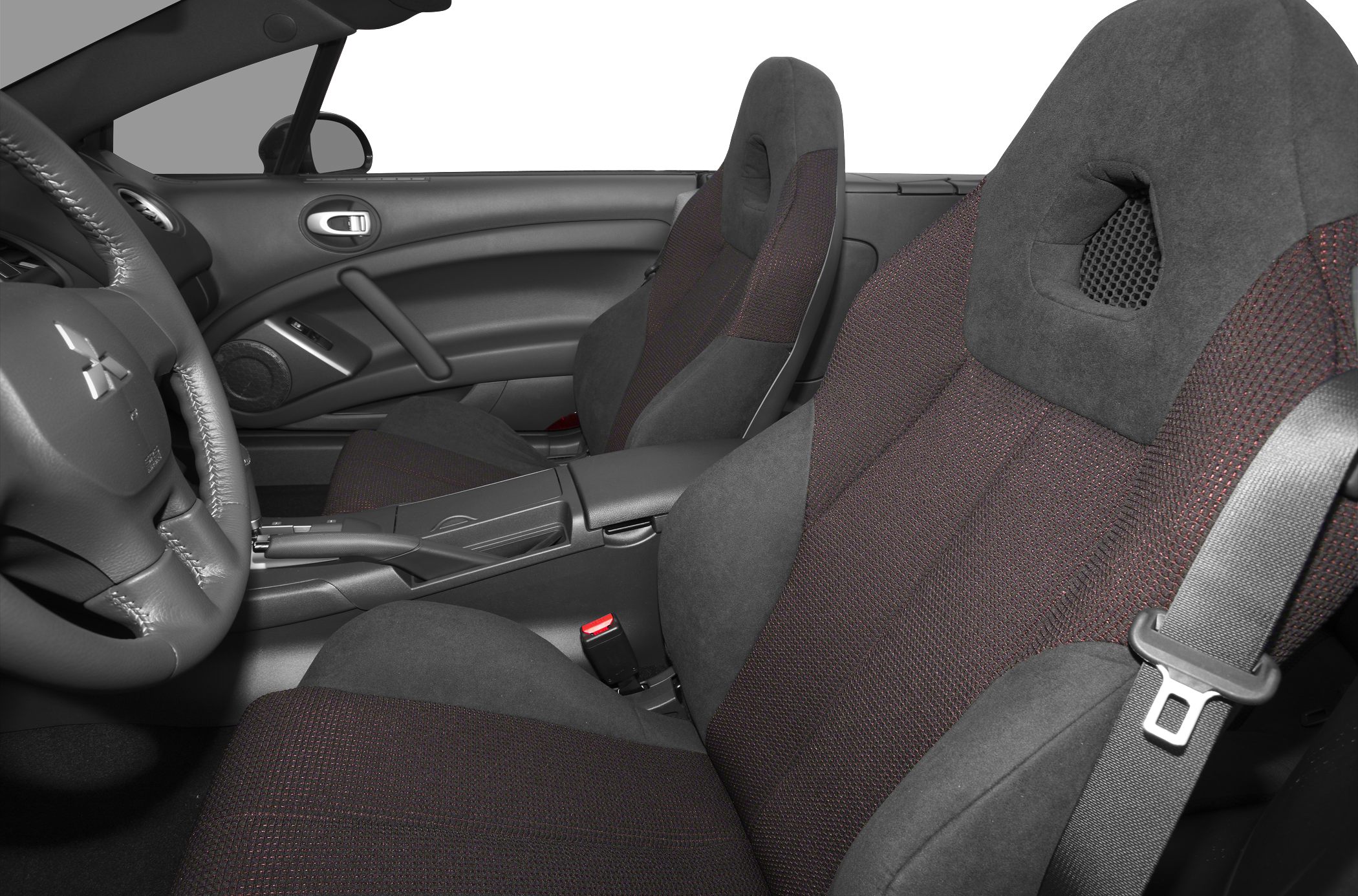 Close-up of sports seats and steering wheel in car interior