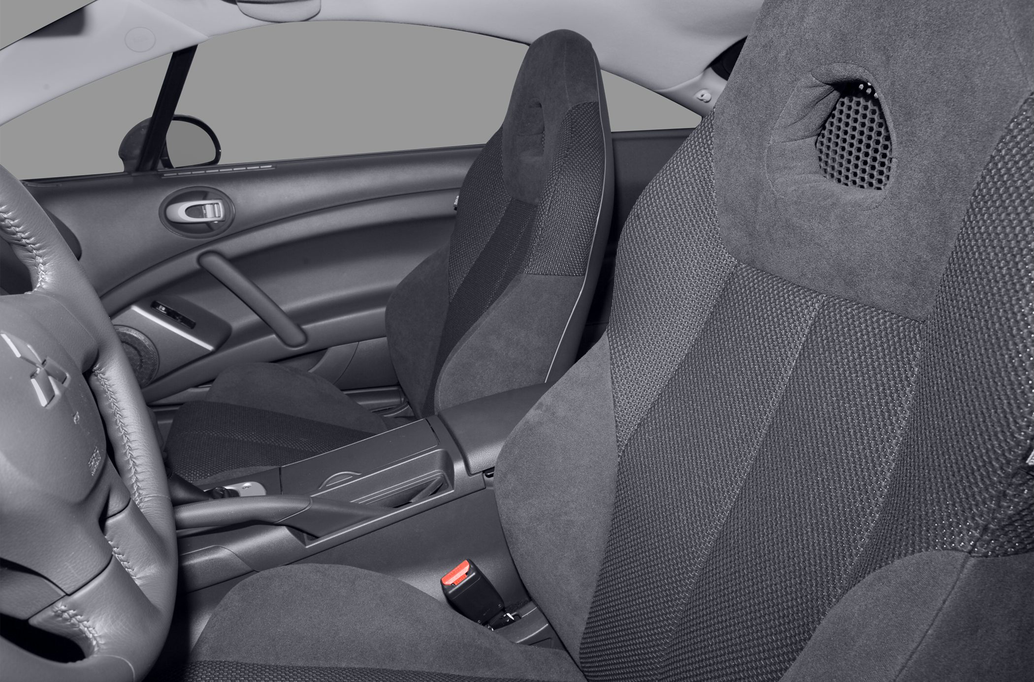 Front fabric sport seats and door panel interior view