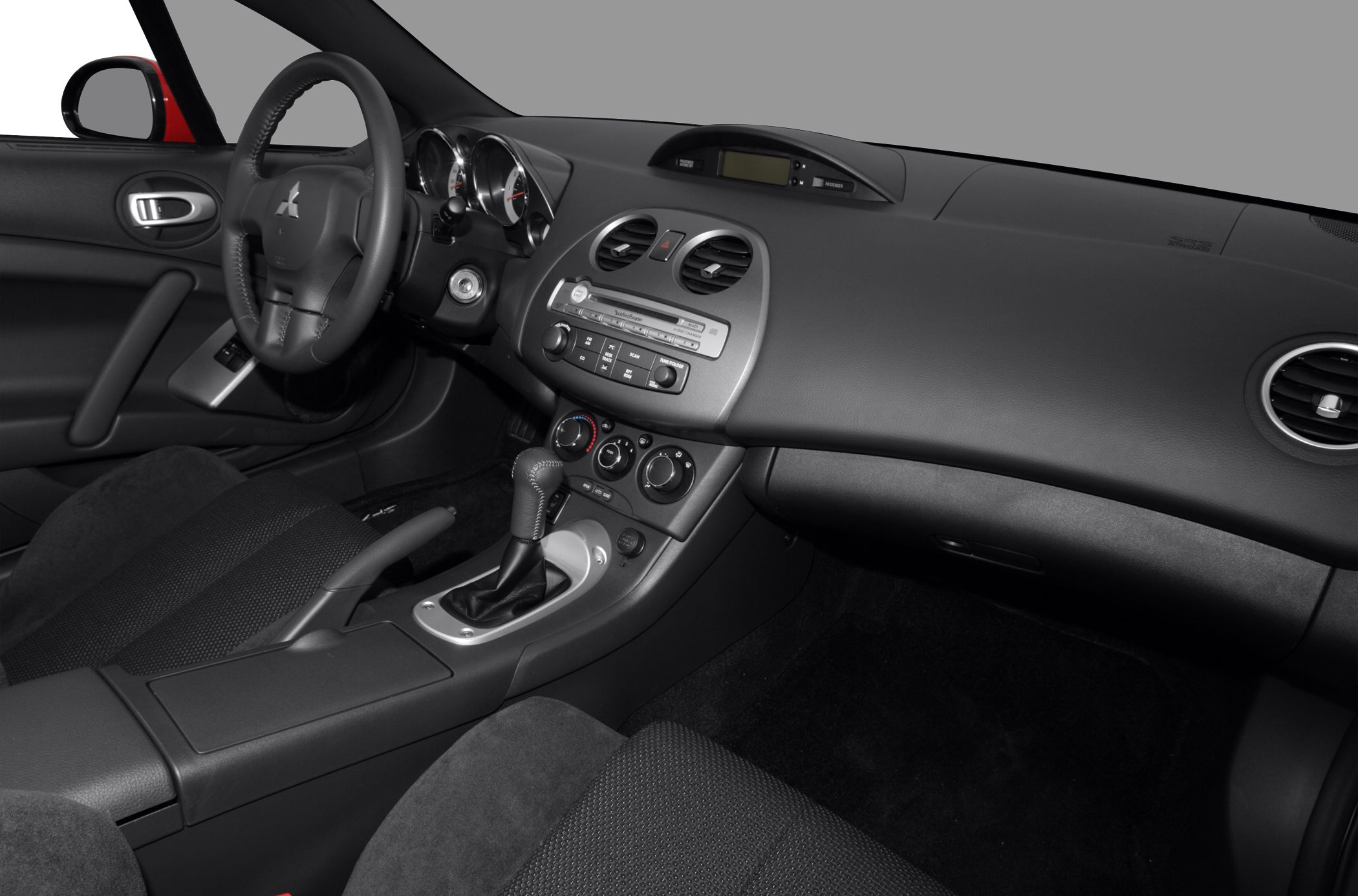 Dashboard and center console with steering wheel and gear shift
