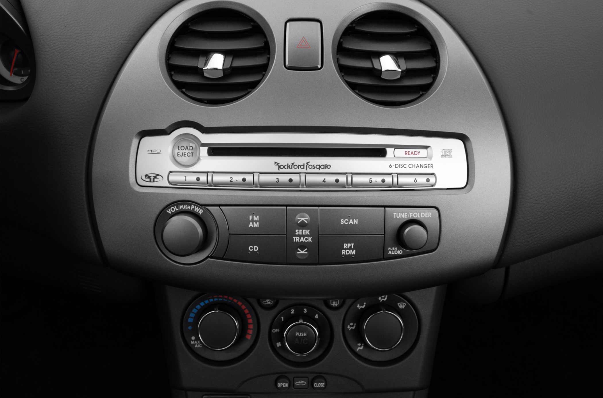 Dashboard audio system and climate control knobs