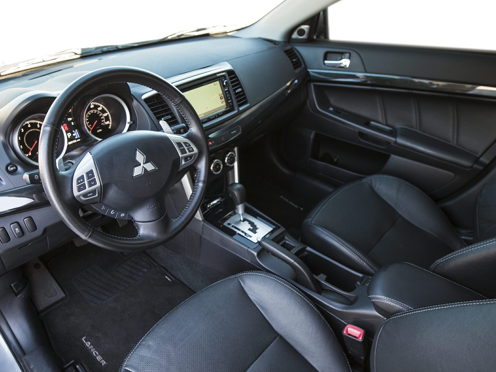 Steering wheel, dashboard, center console interior view