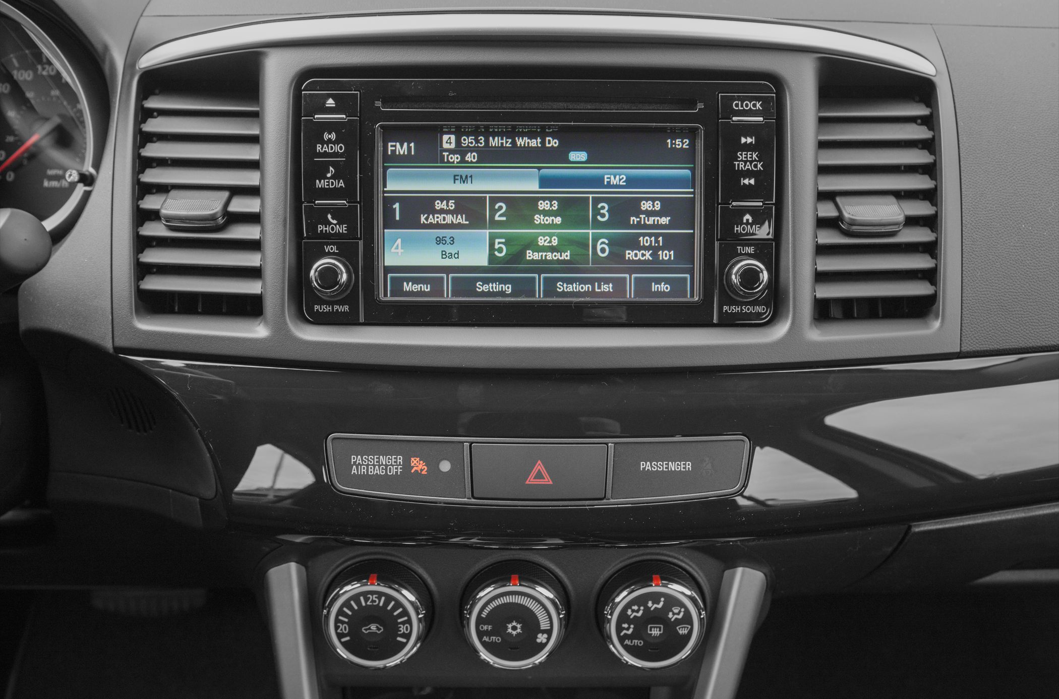 Dashboard multimedia display and climate control knobs
