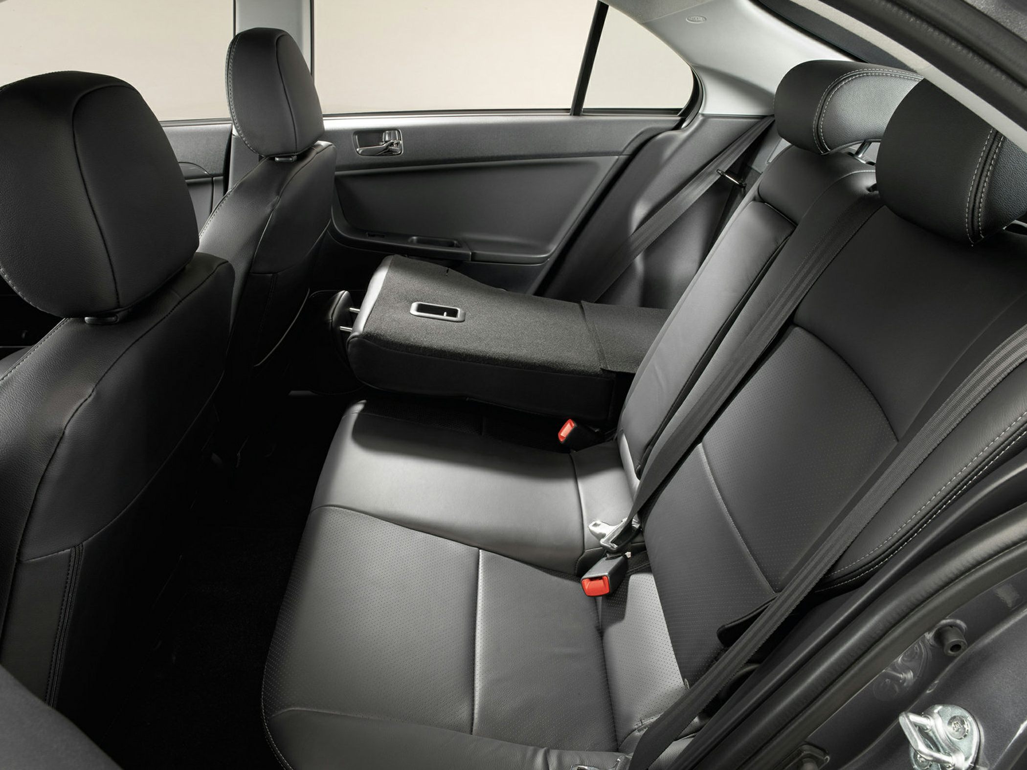 Rear seat fold-down with black leather upholstery