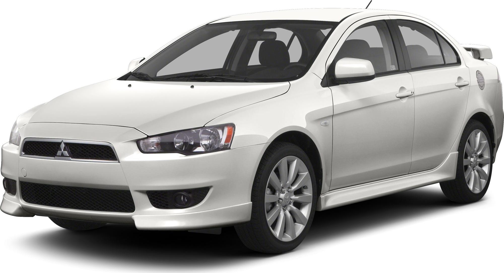 Sporty sedan front three-quarter with alloy wheels and sleek headlamps