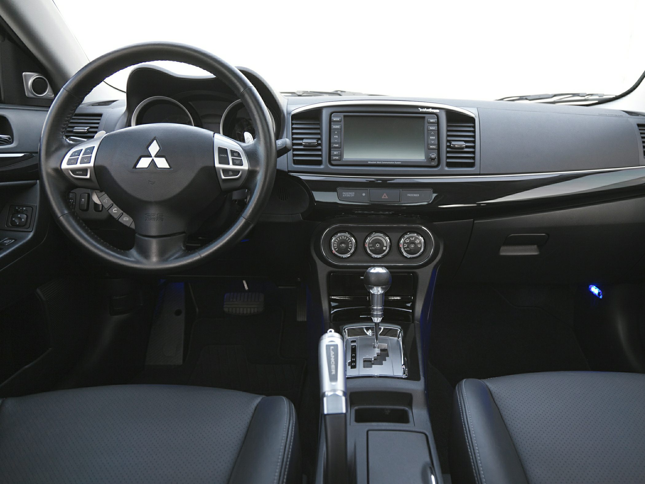 Dashboard and center console with steering wheel and multimedia system