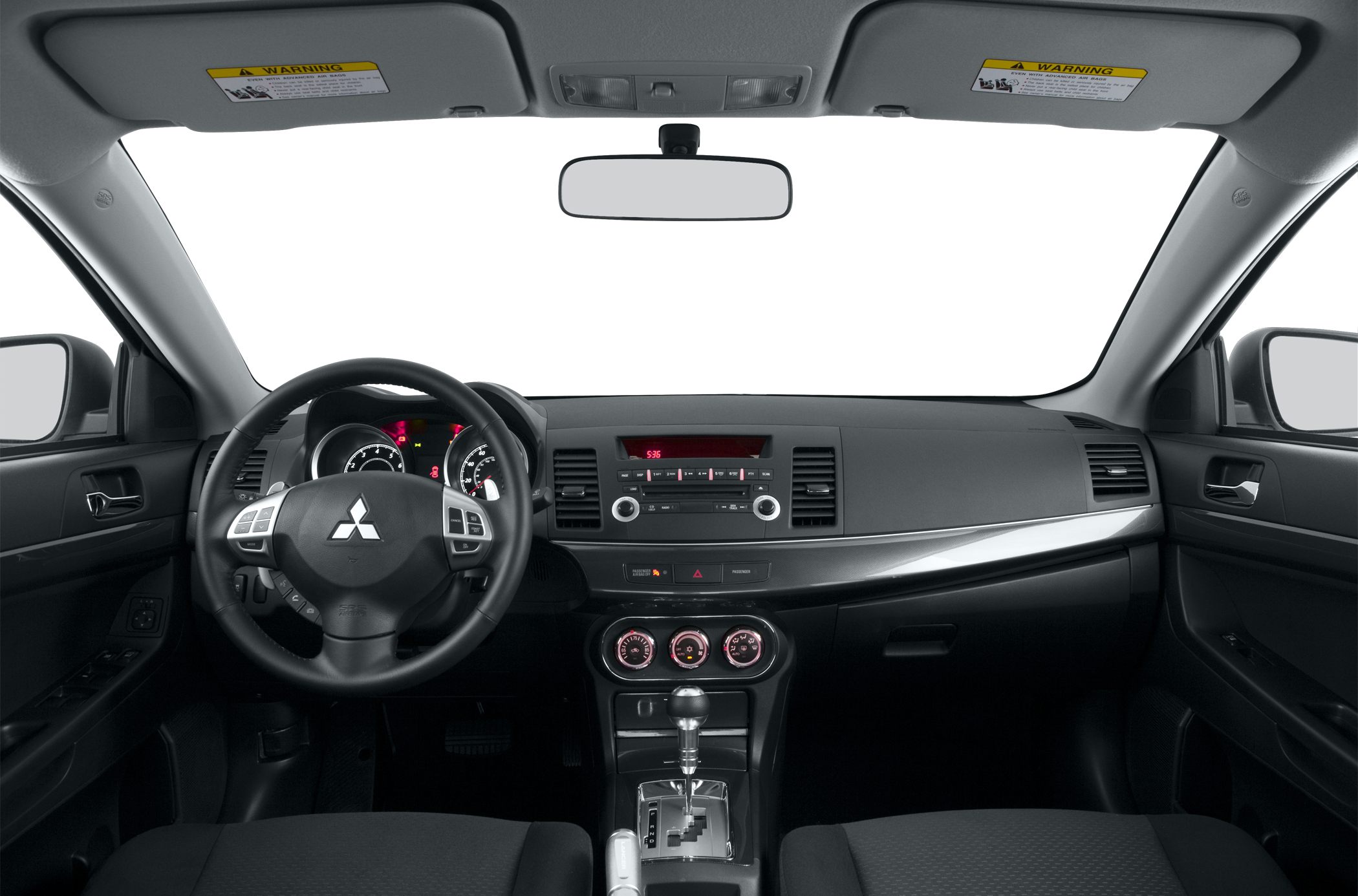 Interior dashboard, steering wheel, center console with climate controls and gear shift