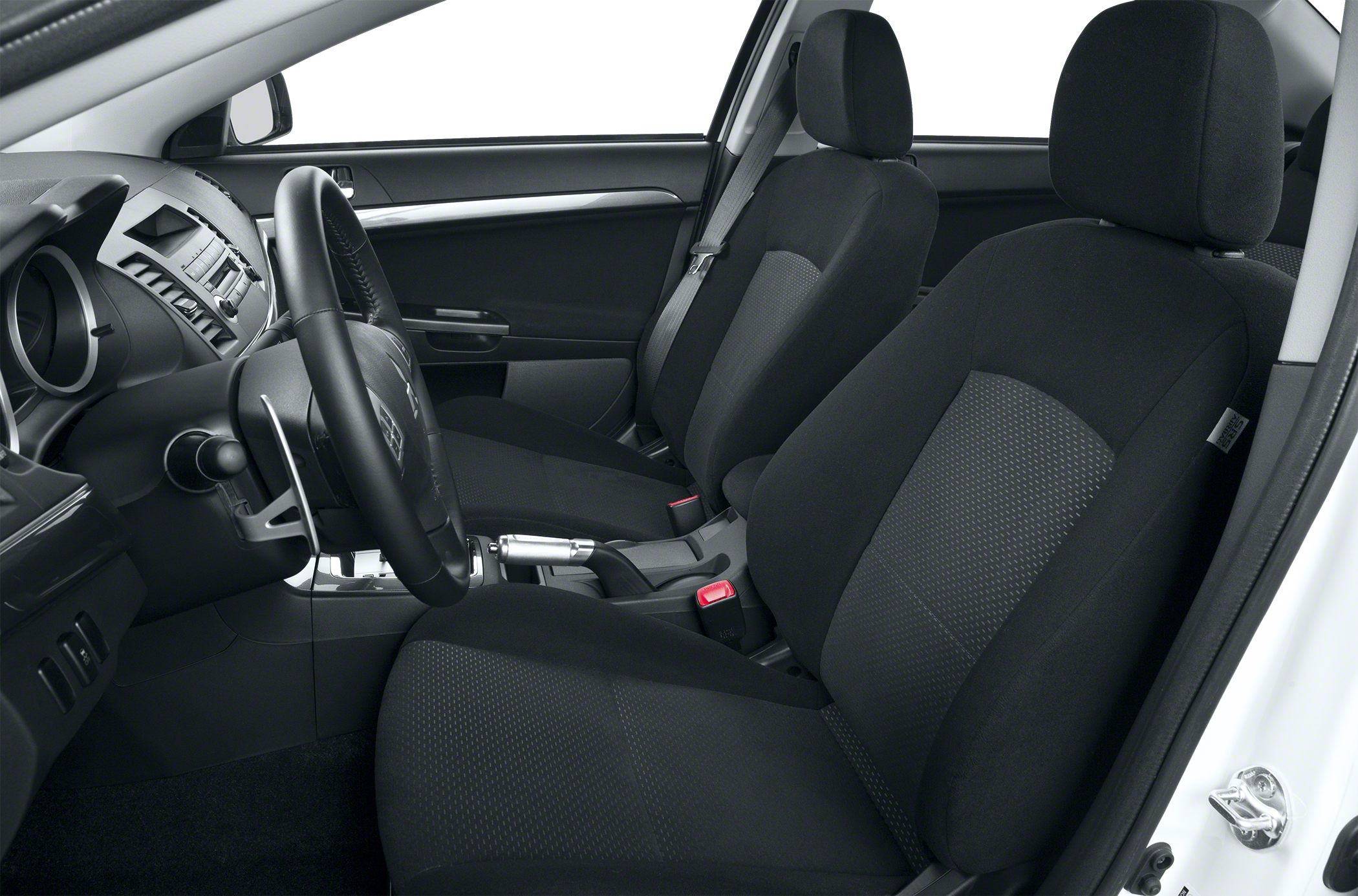 Front seats and dashboard inside a compact sedan