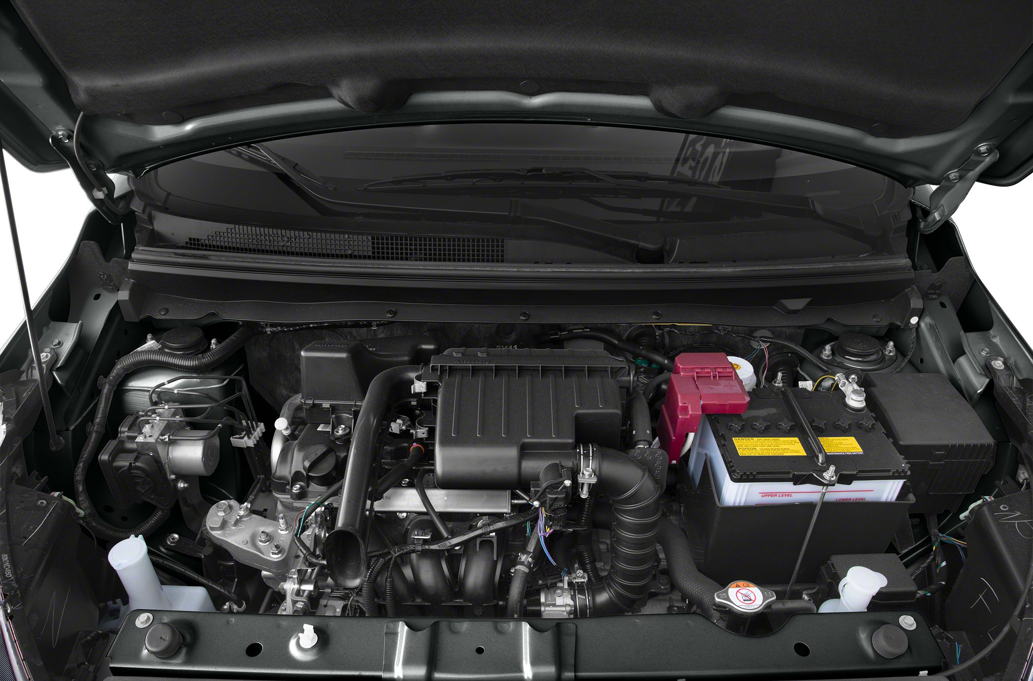 Compact car engine bay with visible air intake and battery layout