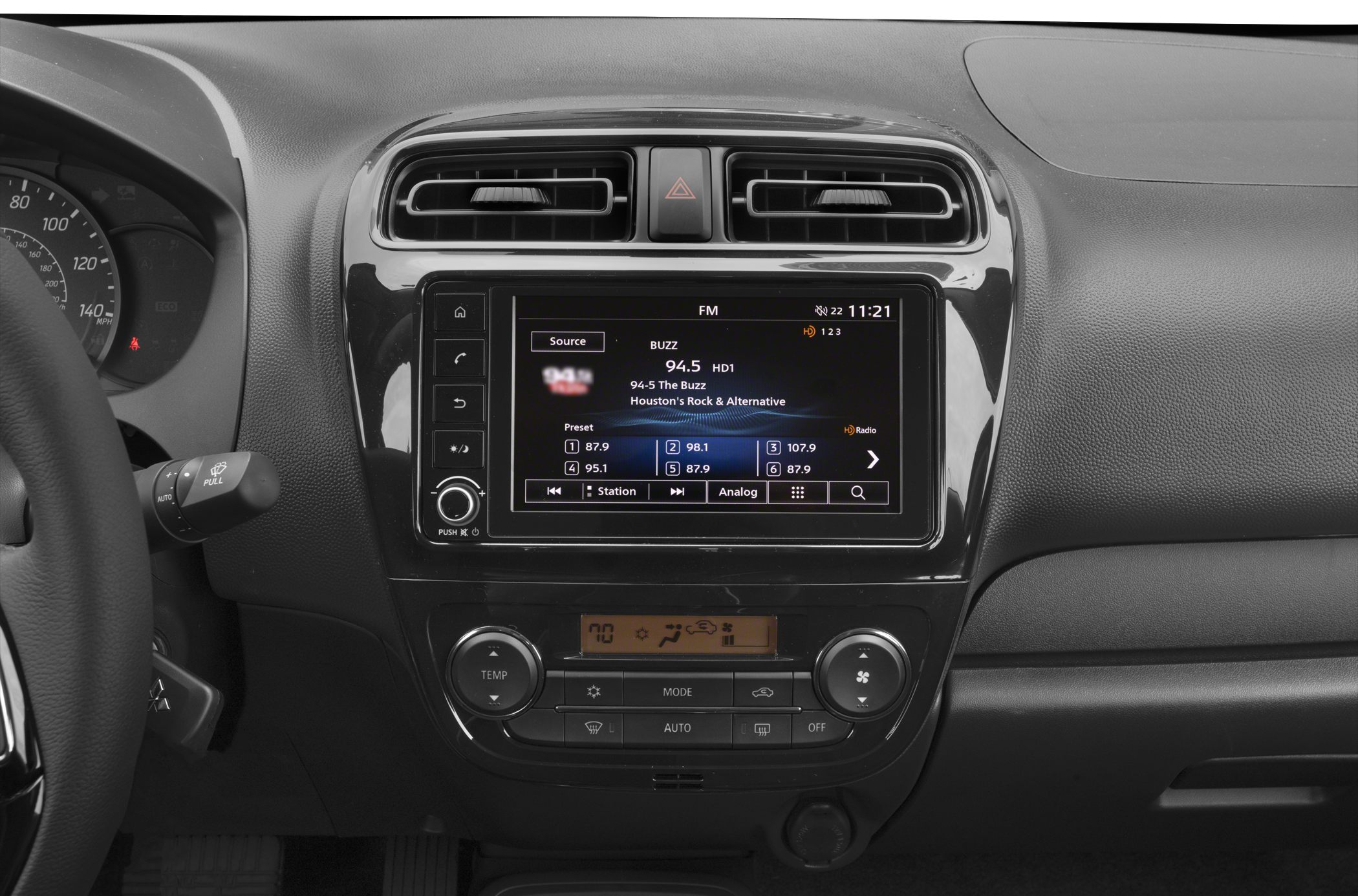 Dashboard with infotainment screen and climate control knobs