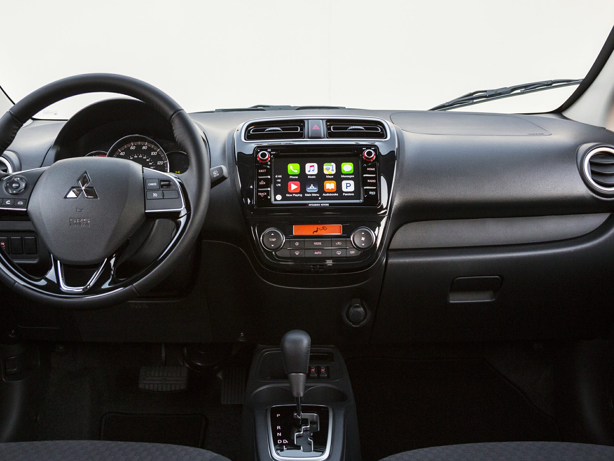 Compact car interior dashboard with infotainment and automatic gear shift
