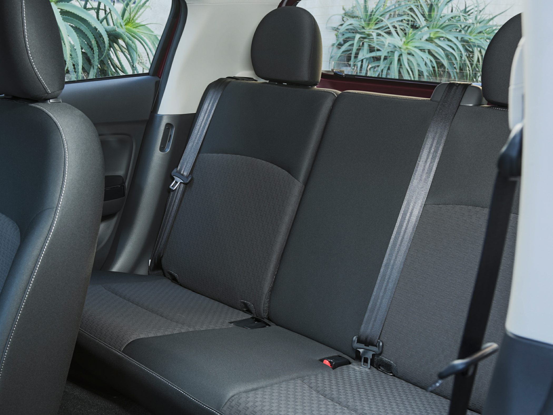 Fabric rear seat with seat belts in a compact hatchback