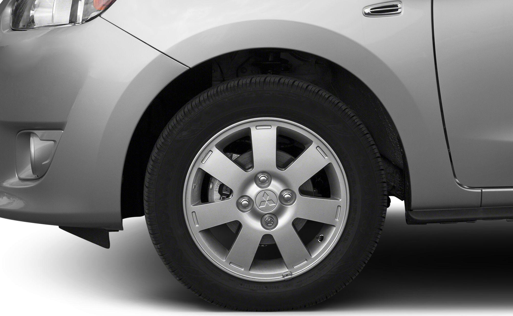 Close-up of an alloy wheel and tire on a vehicle.