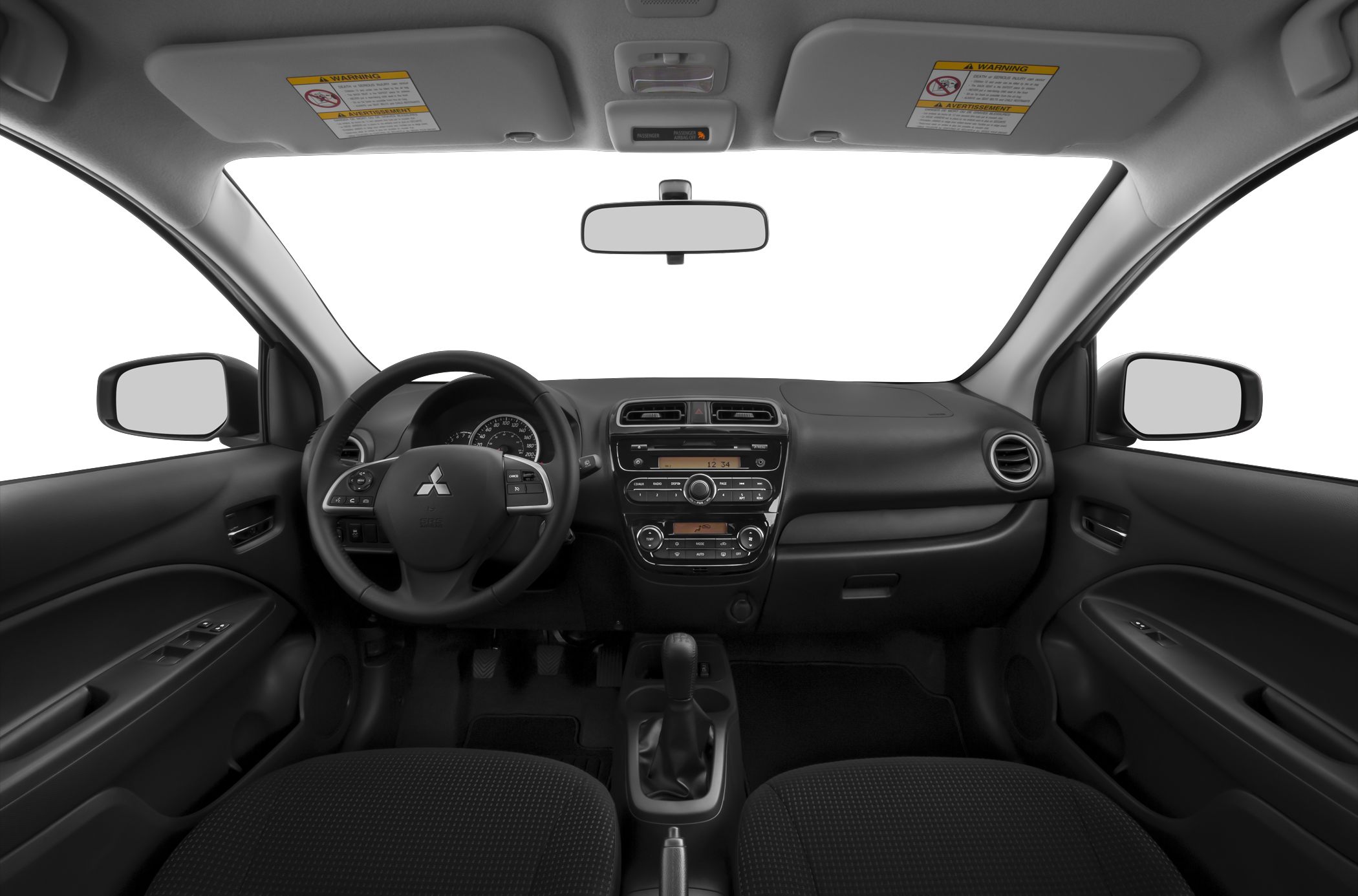 Compact car interior with dashboard, steering wheel, and manual gear shift