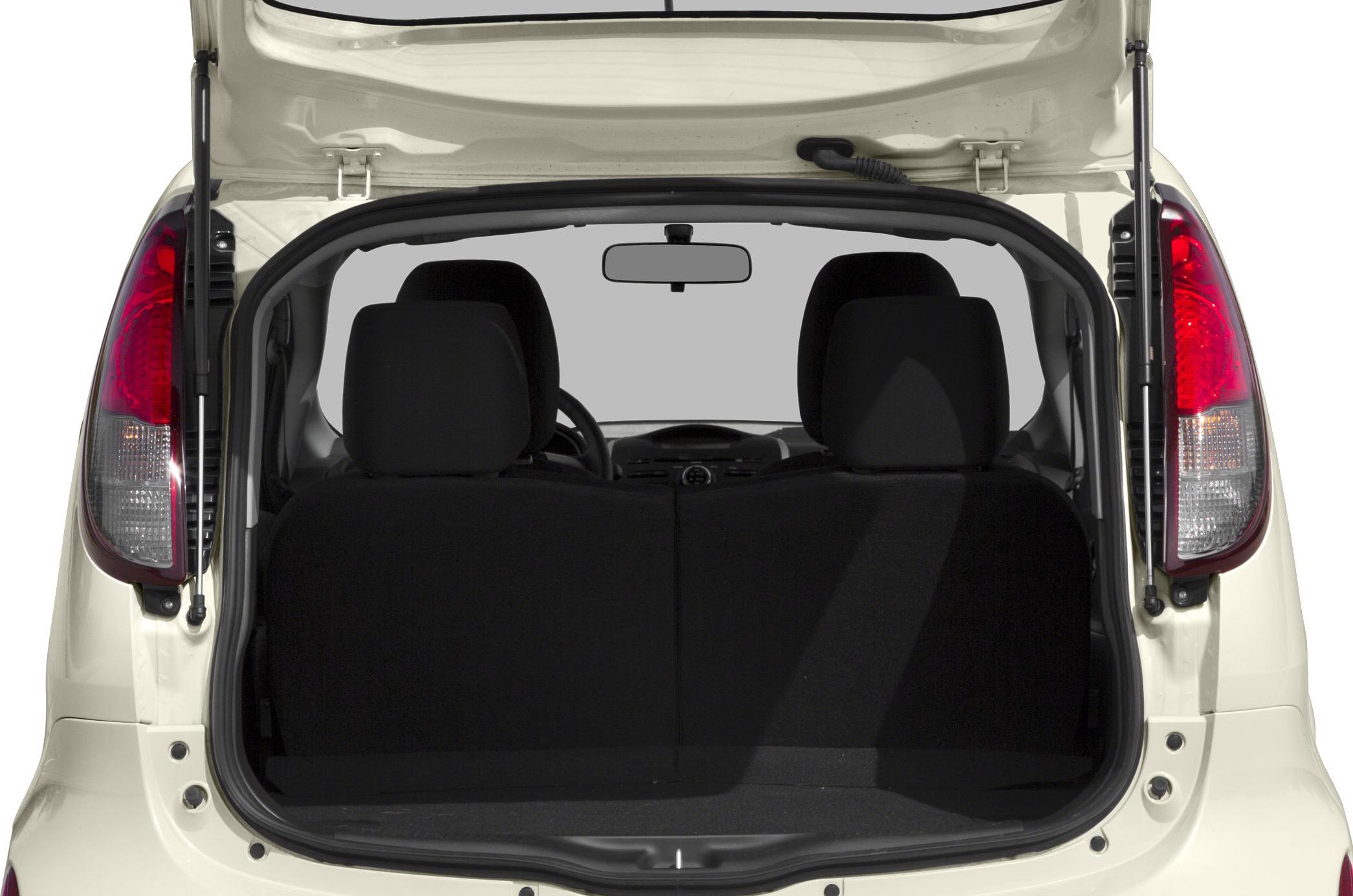 Rear open trunk with cargo space and front seats visible