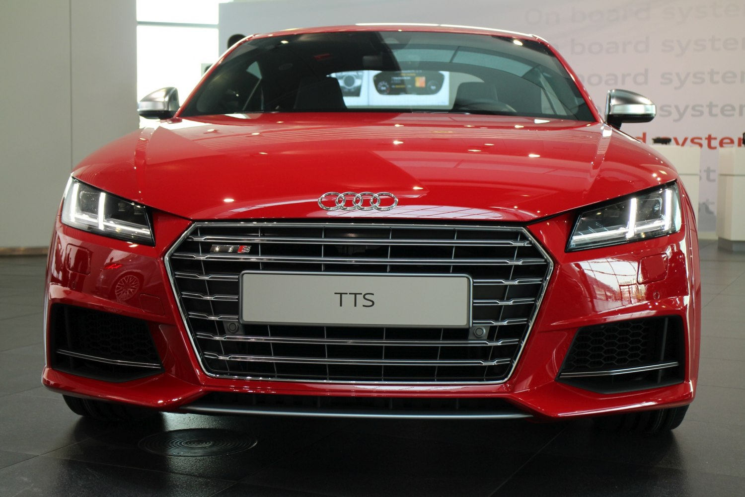 Front view with LED headlights and distinctive grille