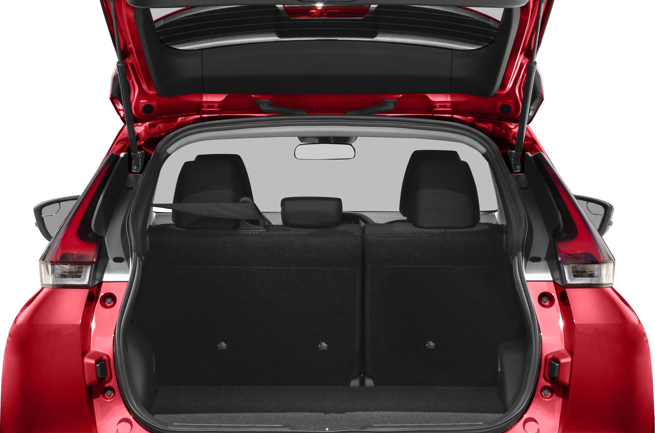 Open rear cargo space and folded rear seats with a raised tailgate