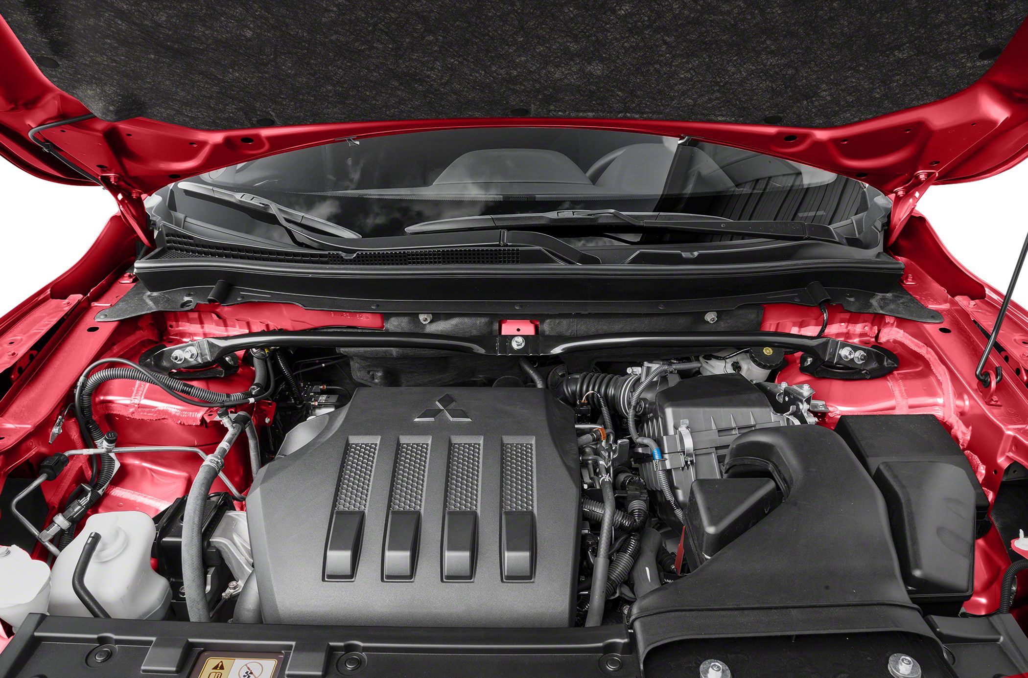 Close-up of engine bay with engine cover and visible mechanical components