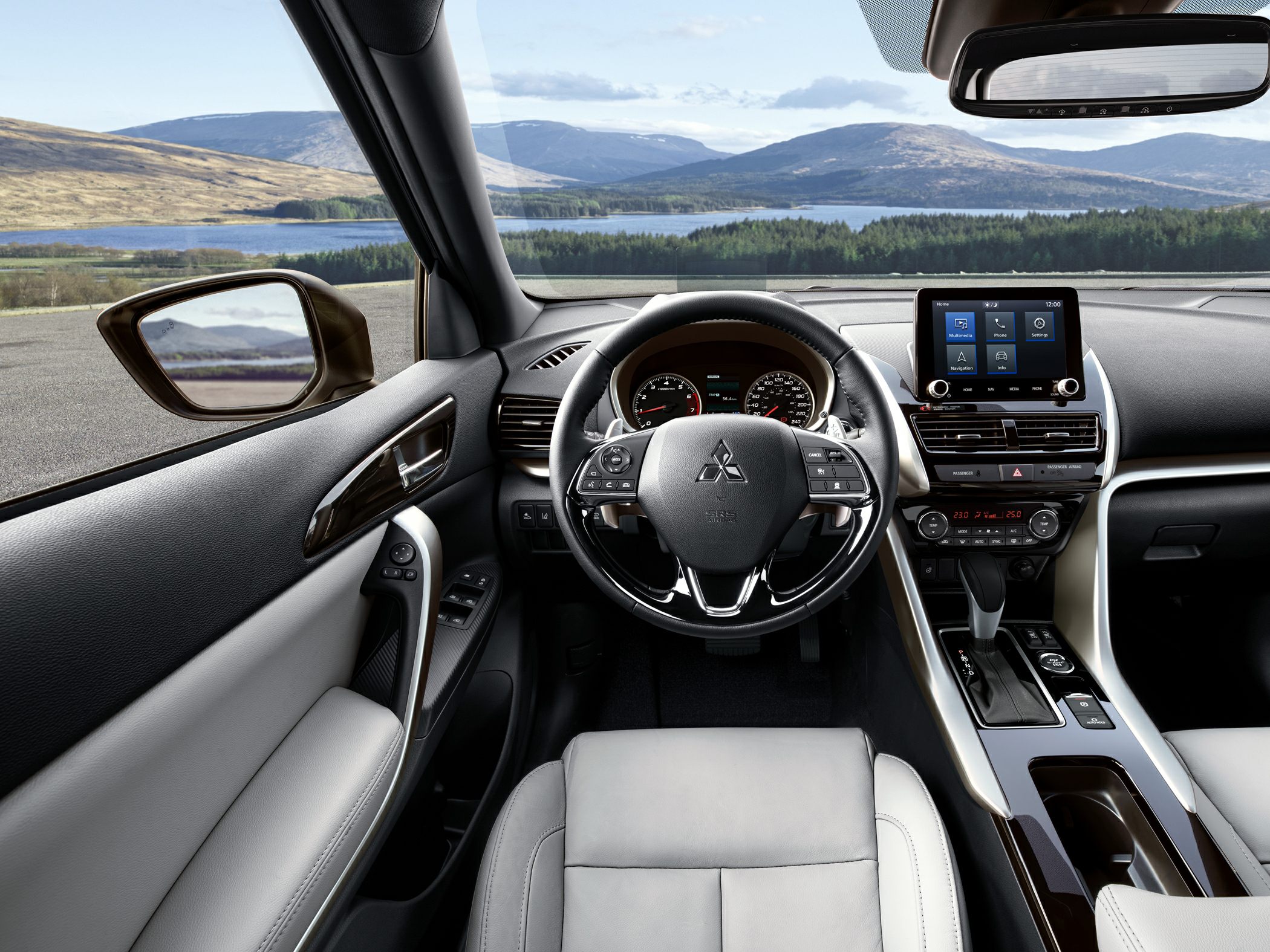 Dashboard and steering wheel with infotainment and controls