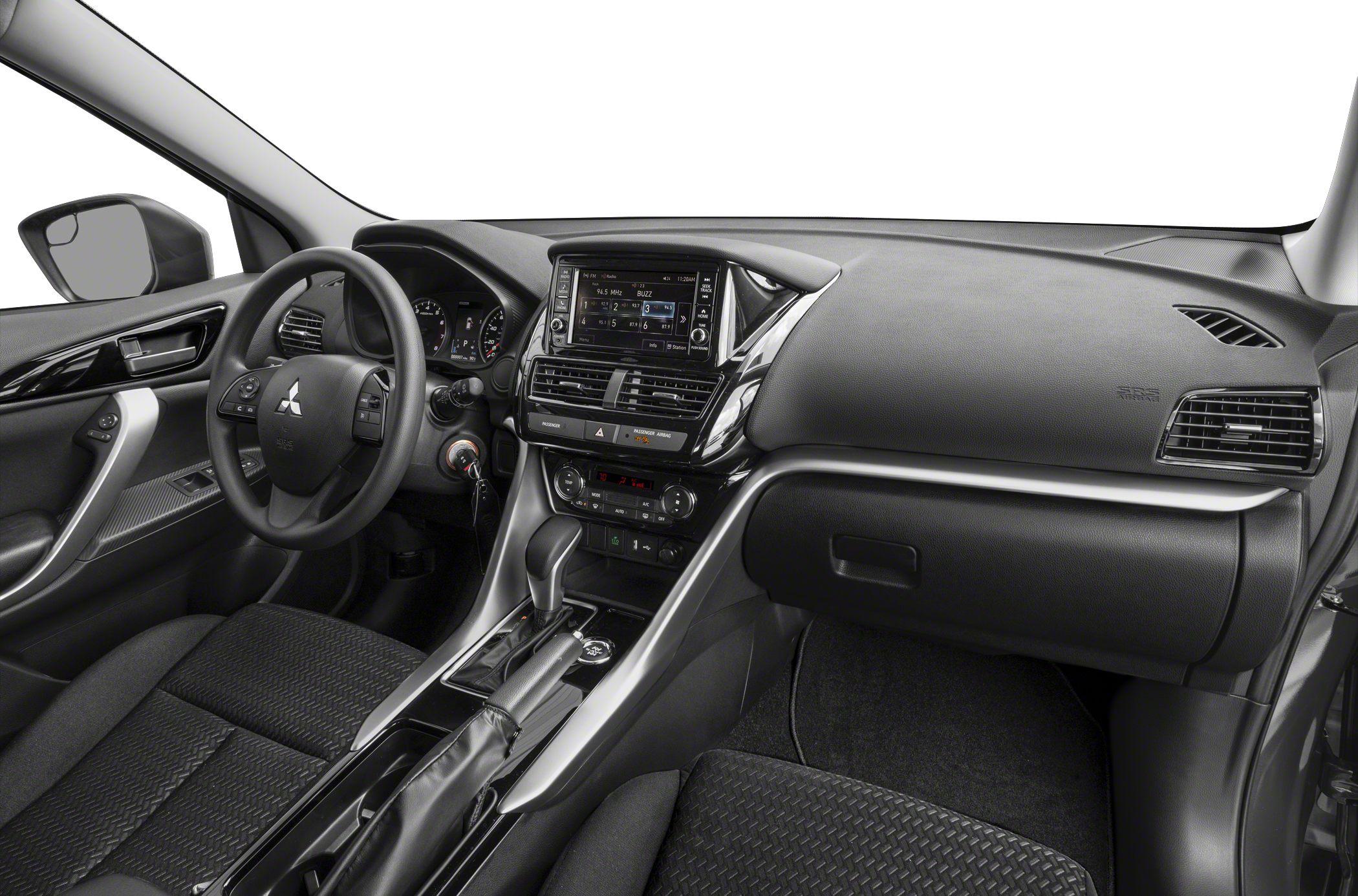 Car interior featuring dashboard and center console with infotainment system and controls