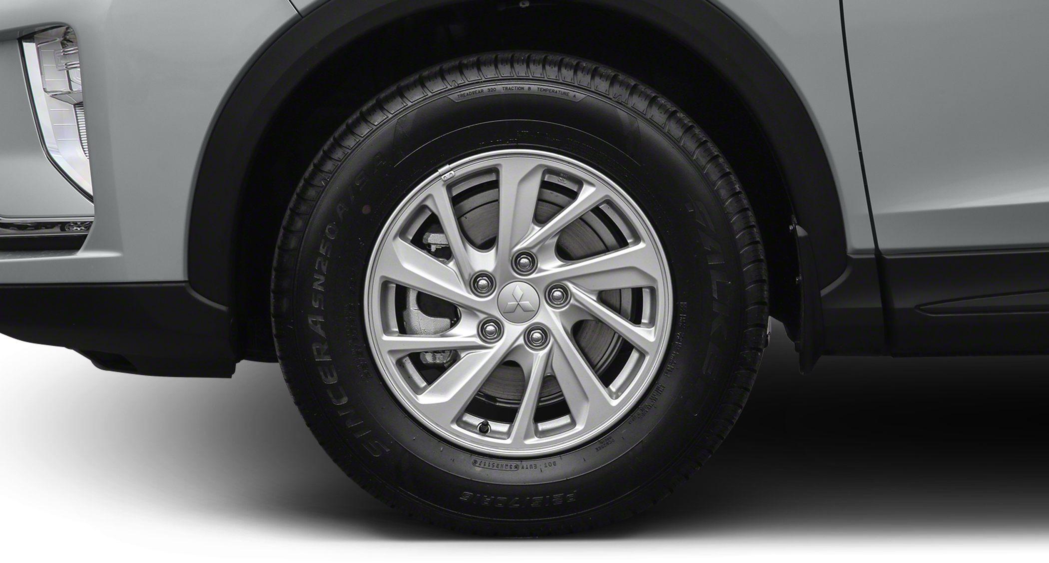 Close-up of alloy wheel and tire on vehicle side panel