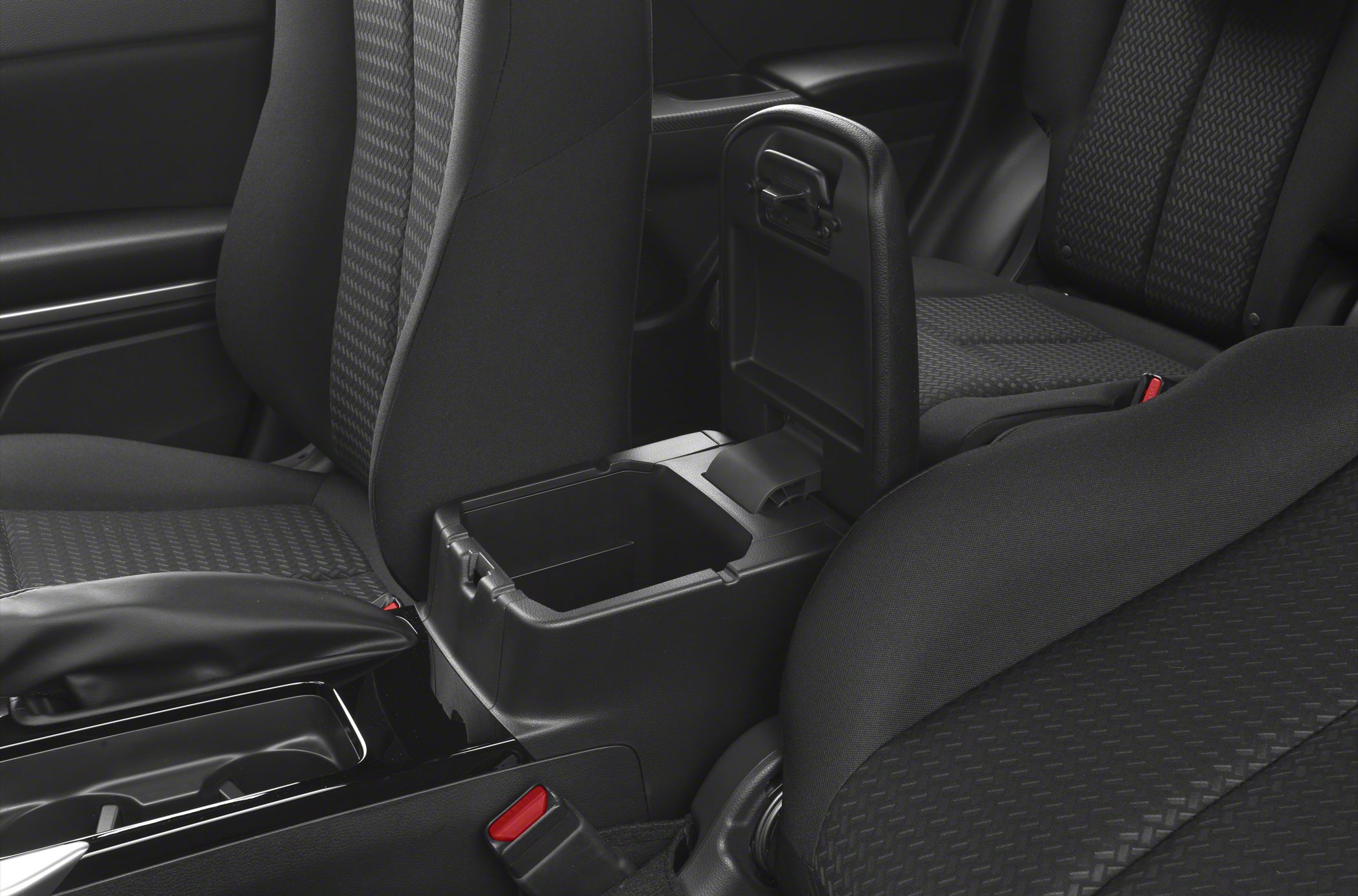 Center console storage compartment and fabric seats