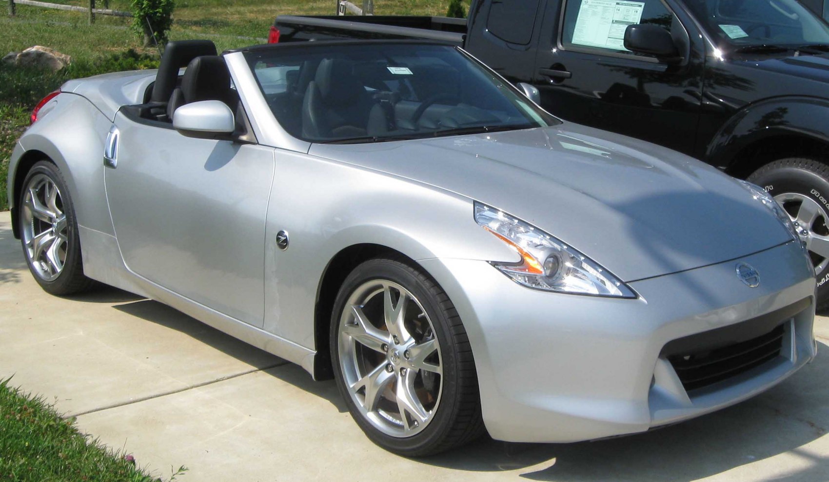 Convertible roadster with alloy wheels and aerodynamic front design