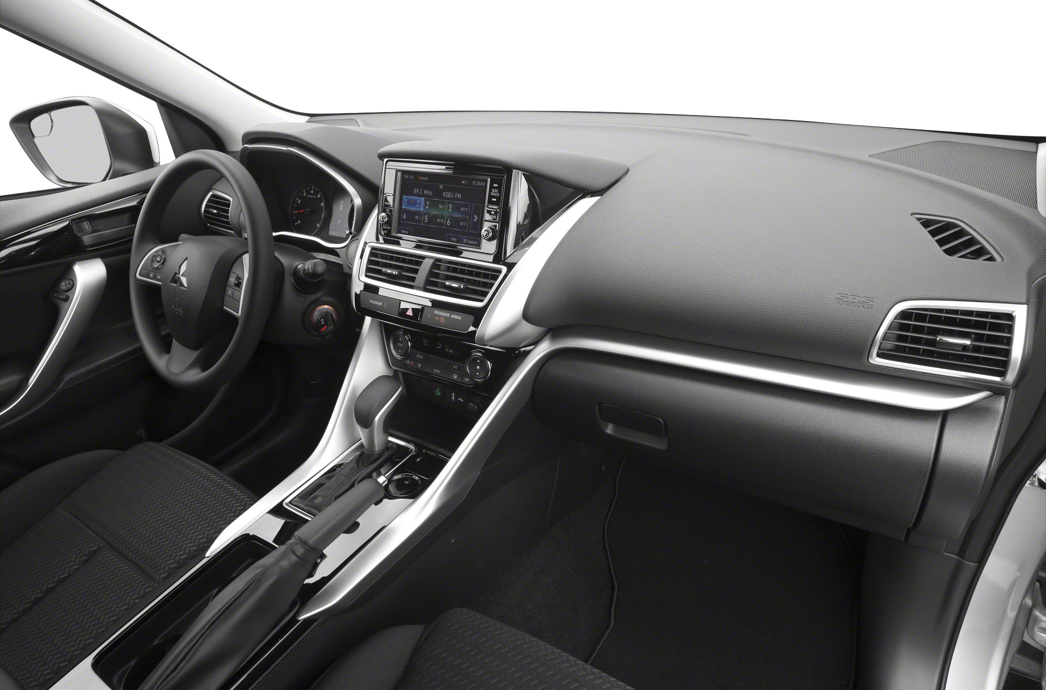Dashboard with touchscreen, steering wheel, center console, gear shifter, handbrake