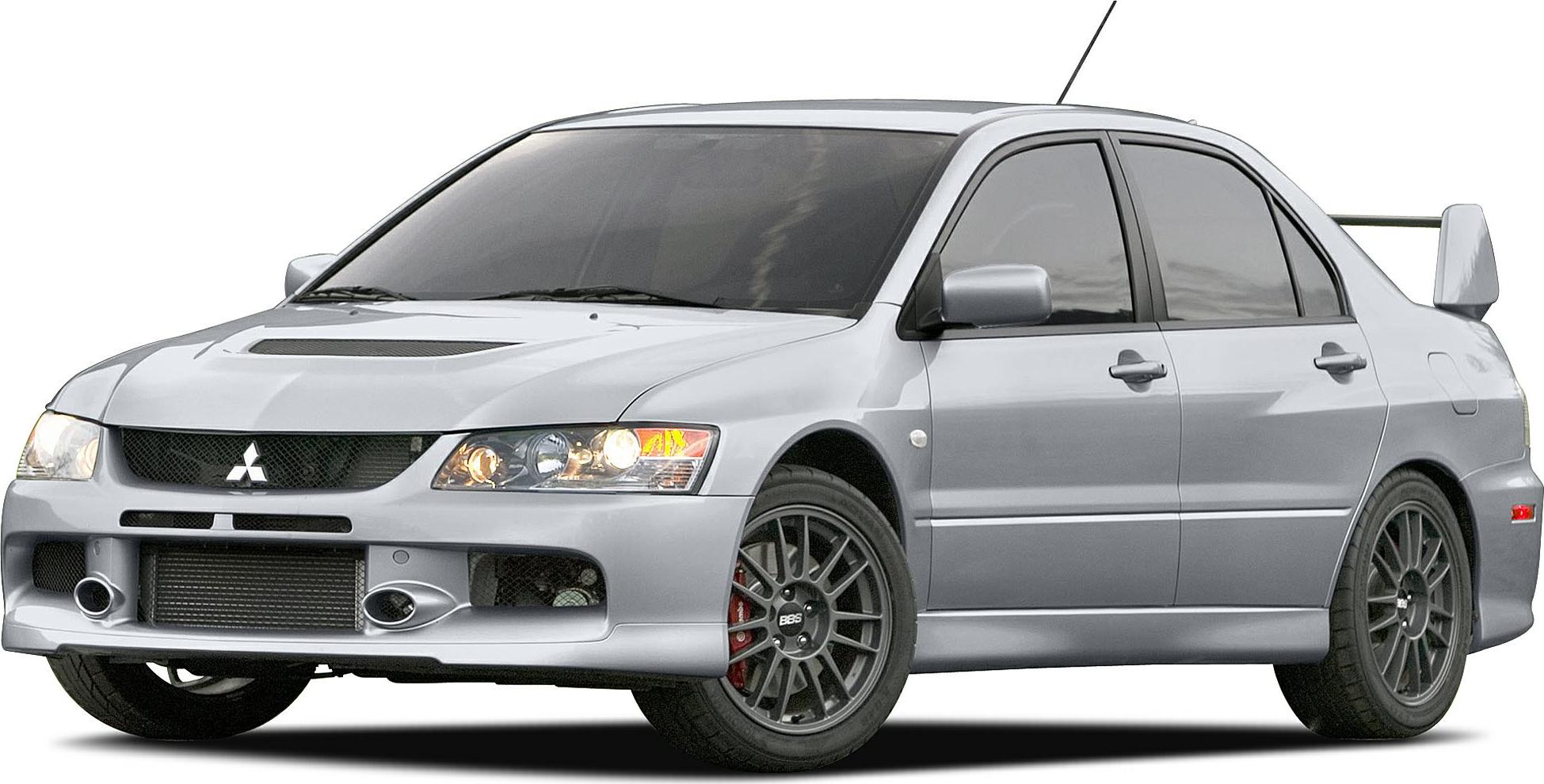 Front side view showcasing hood scoop and rear wing spoiler.