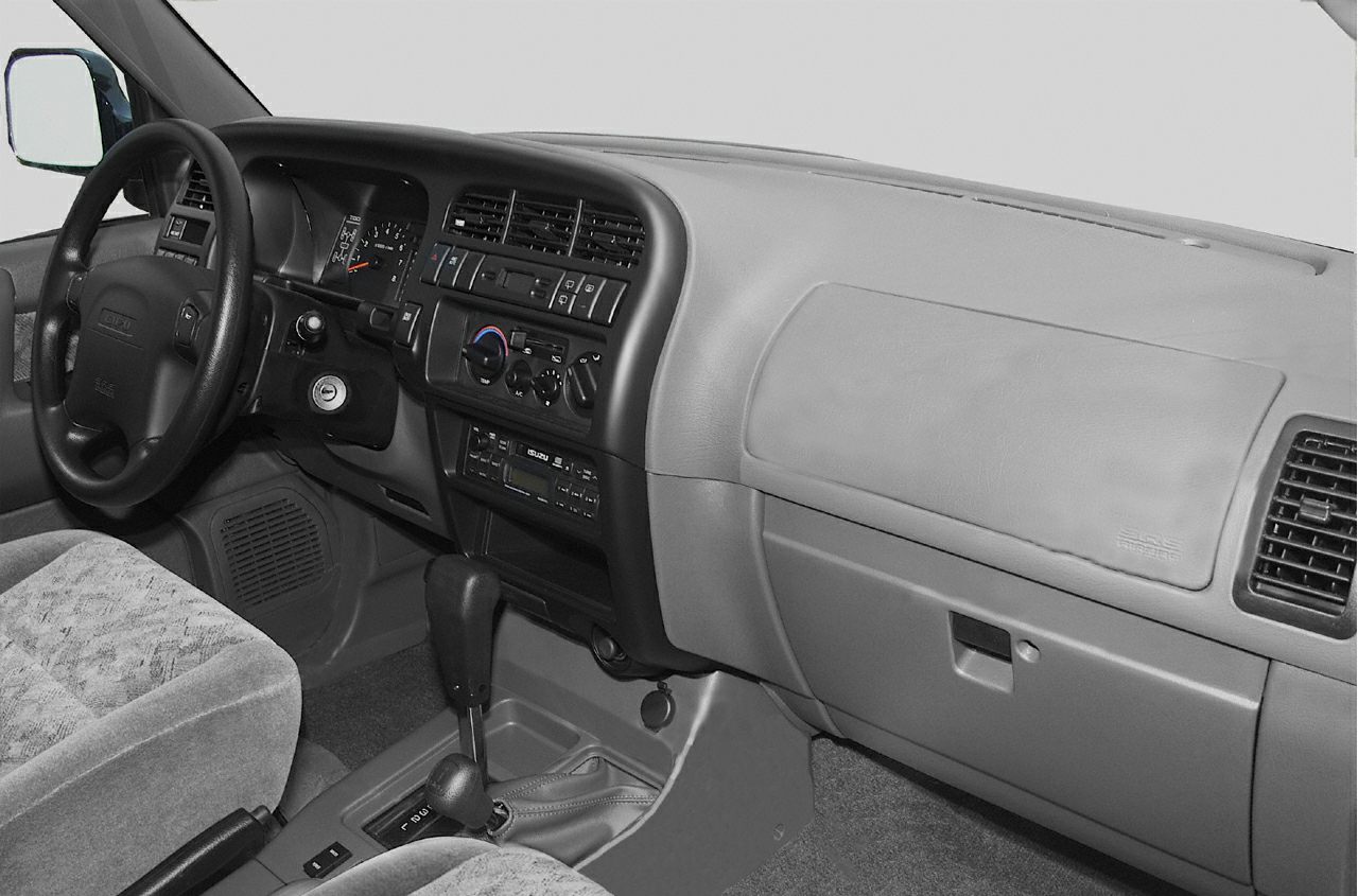 1998 SUV interior dashboard with steering wheel and gear shift