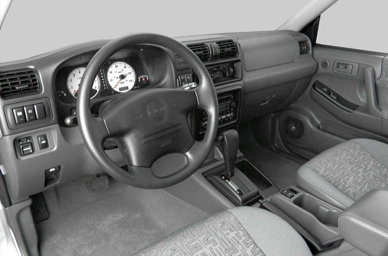 Dashboard, steering wheel, center console with automatic gear shifter and controls