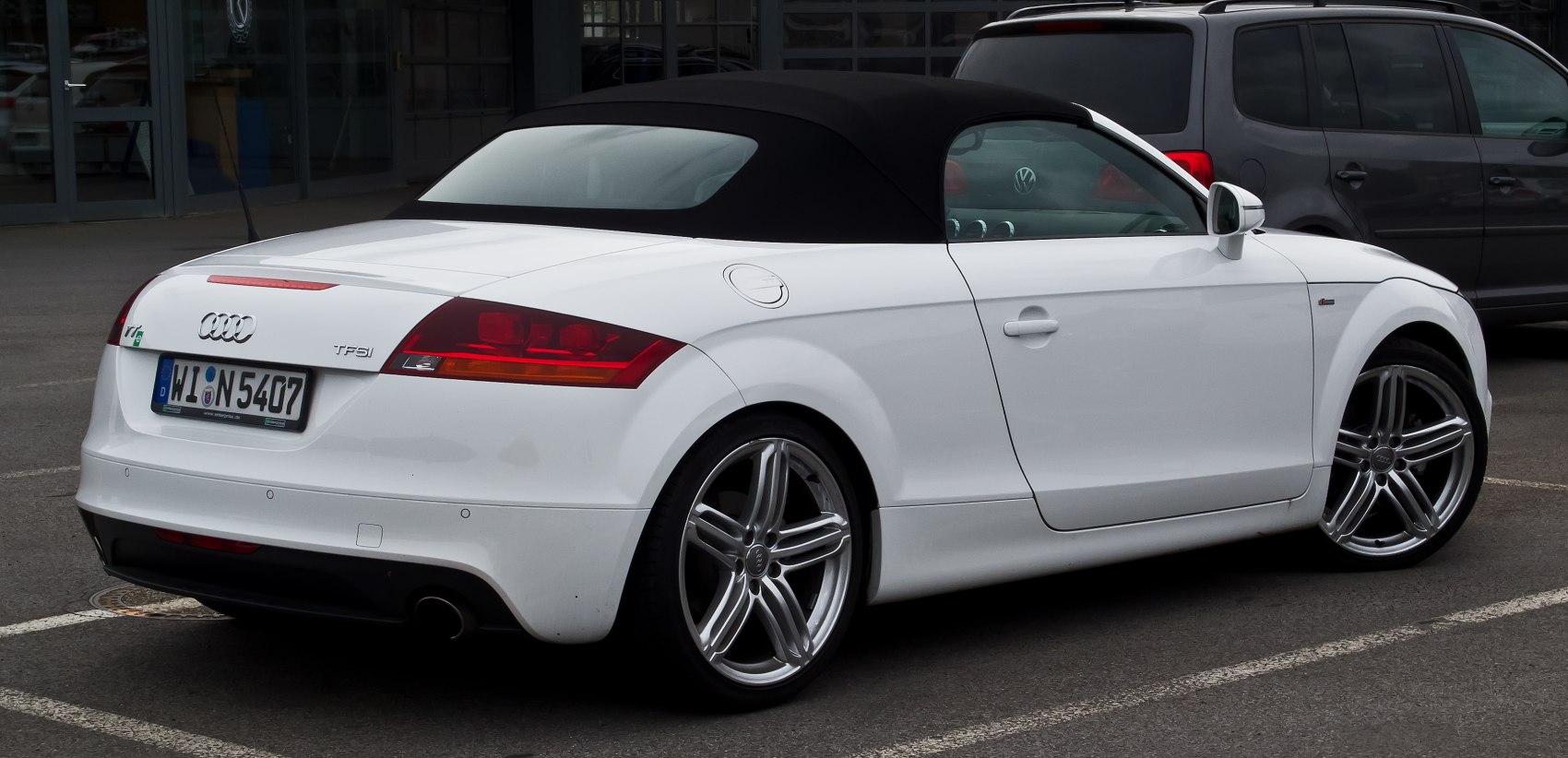 Convertible soft top rear and side view with alloy wheels