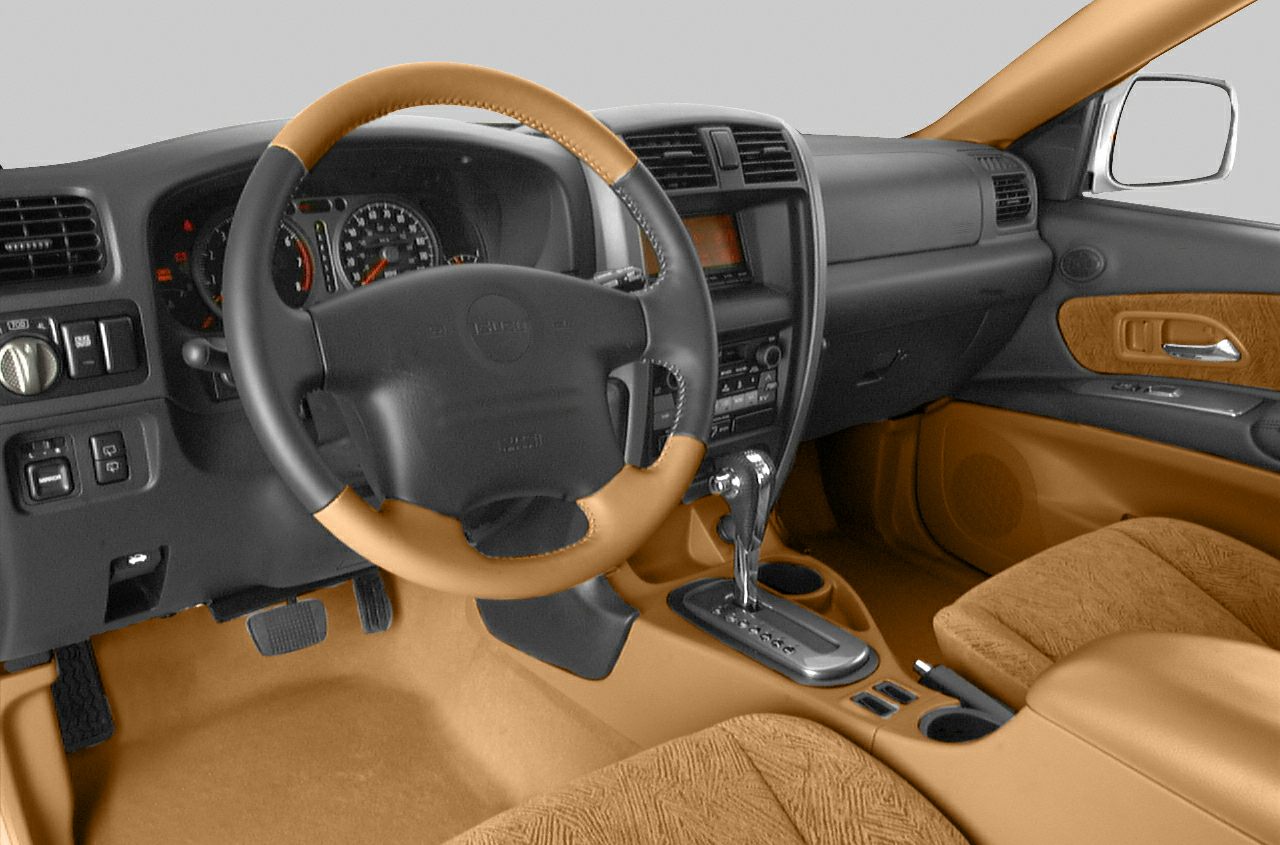 Two-tone steering wheel and center console with automatic shifter