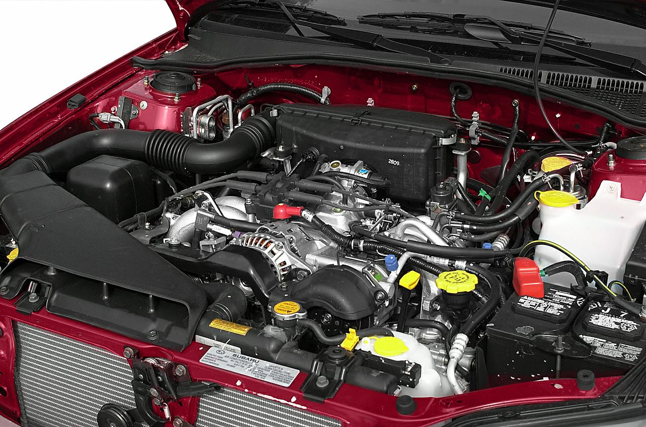Detailed 2003 Subaru Baja engine compartment with visible components and layout