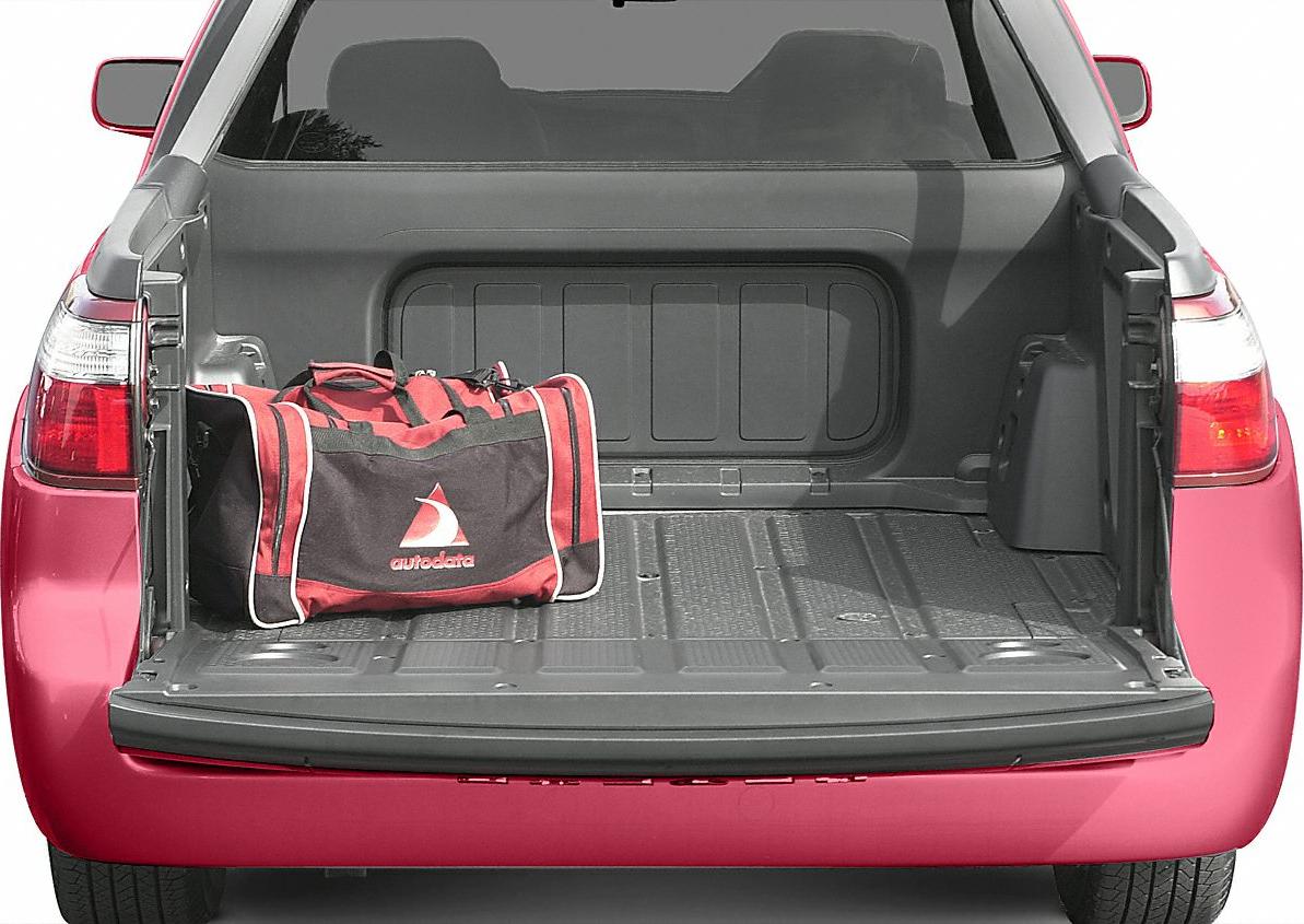 Open truck bed with protective liner and sports bag