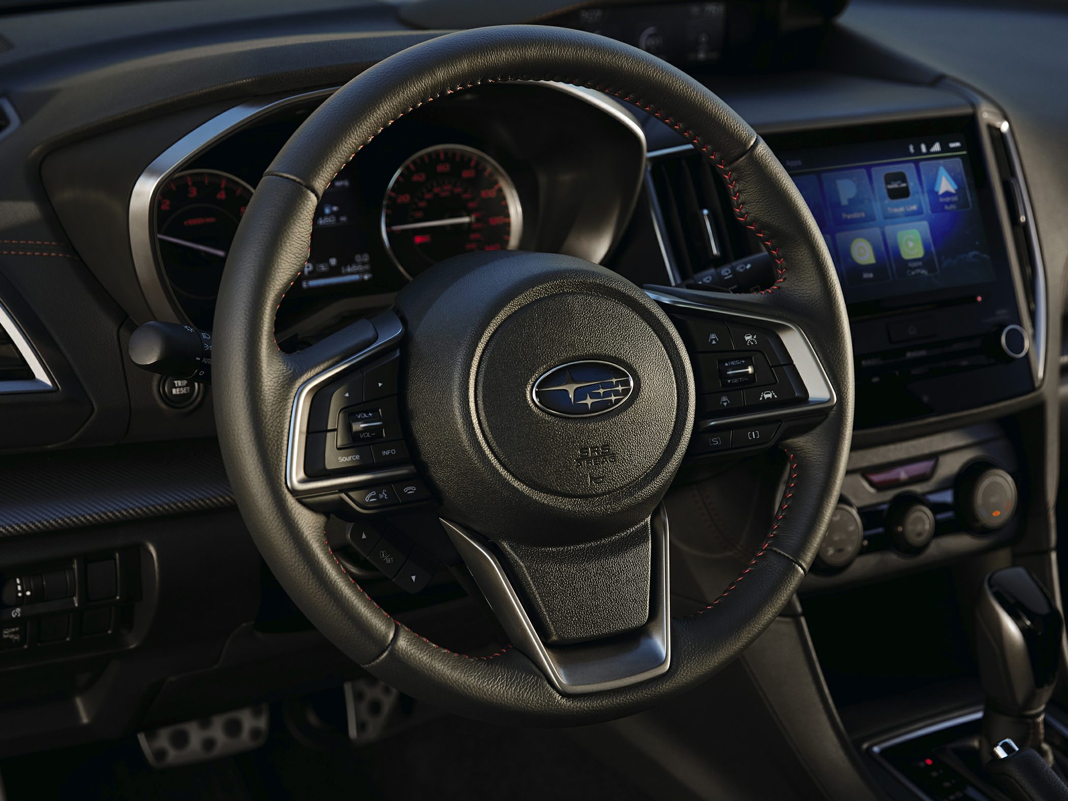 Modern steering wheel with control buttons and touchscreen infotainment system