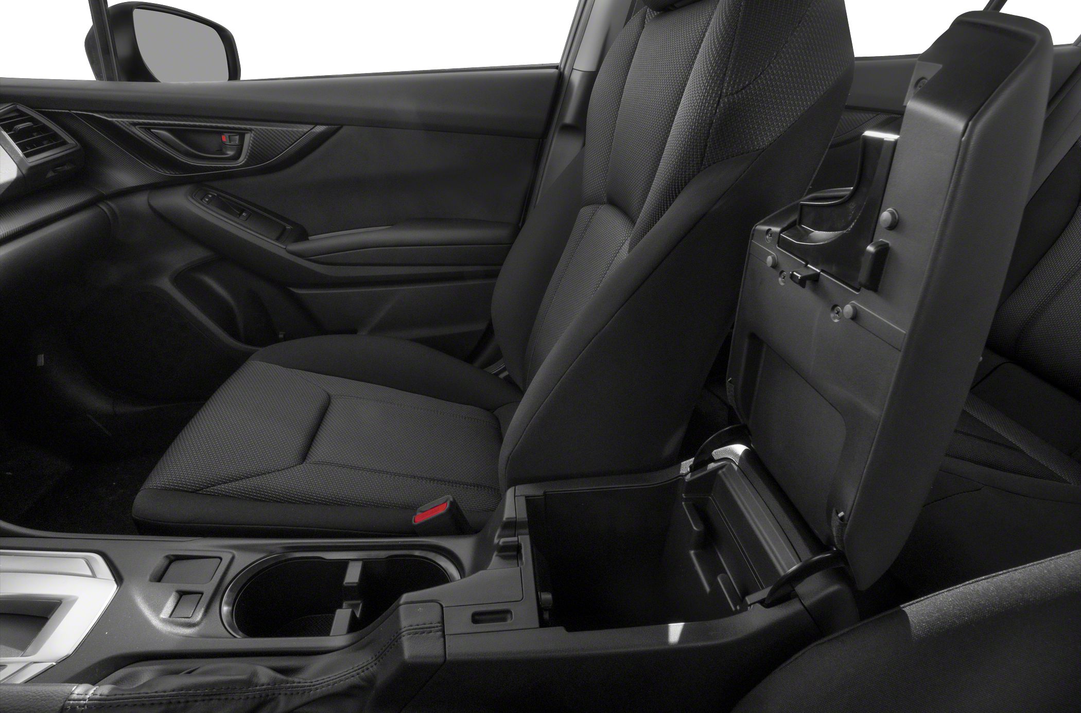 Front passenger seat and open center console storage compartment in black upholstery.