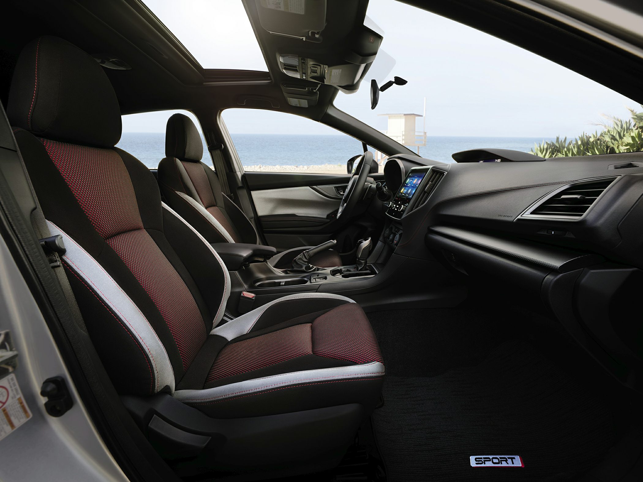 Sport seats and panoramic sunroof in hatchback interior