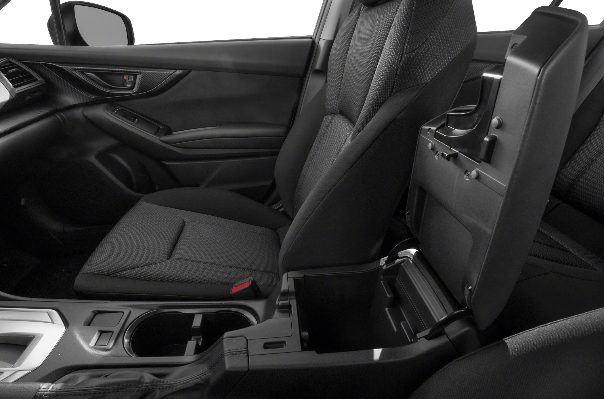 Modern car interior with front seats and open center storage console