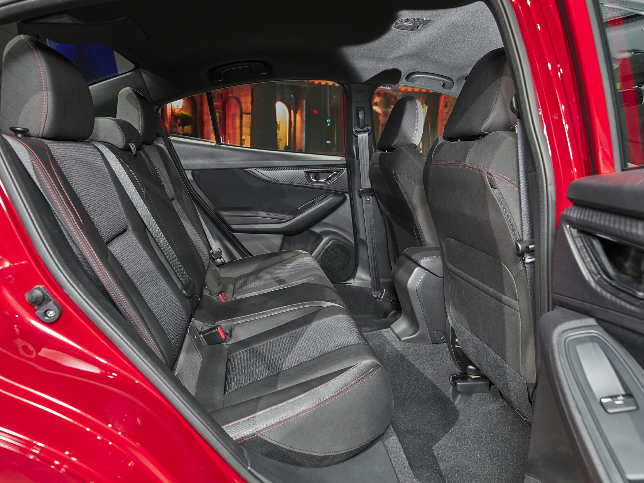 Spacious rear seating with fabric upholstery and door panel details