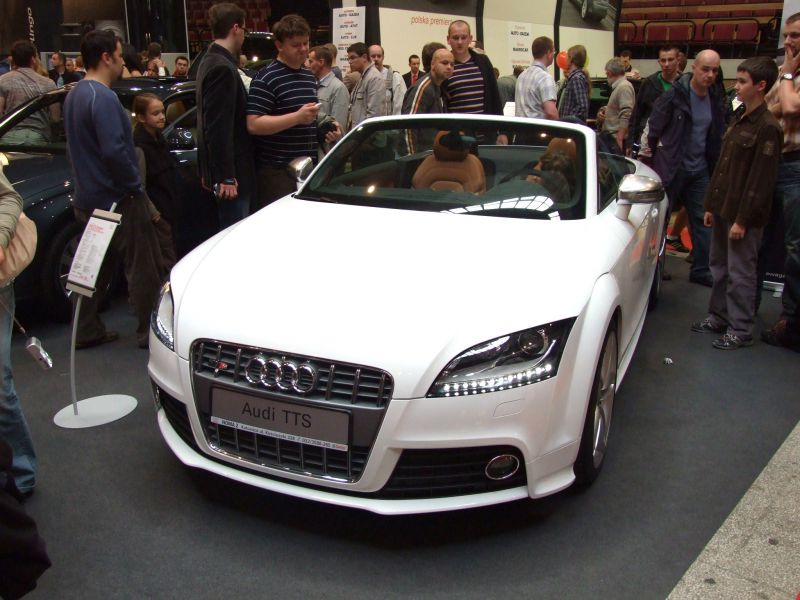 White Audi TTS Roadster convertible front with LED headlights and grille