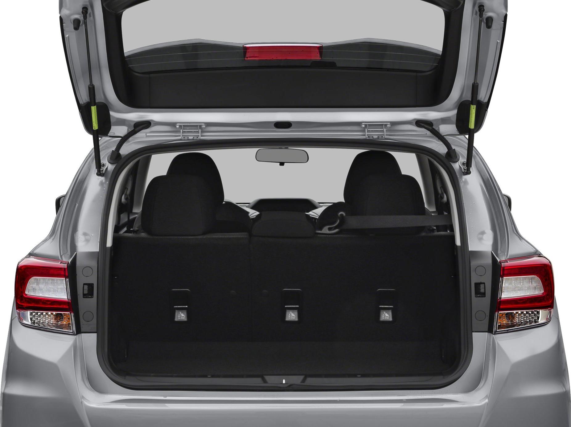 Open hatchback trunk with rear seats and cargo area visible.