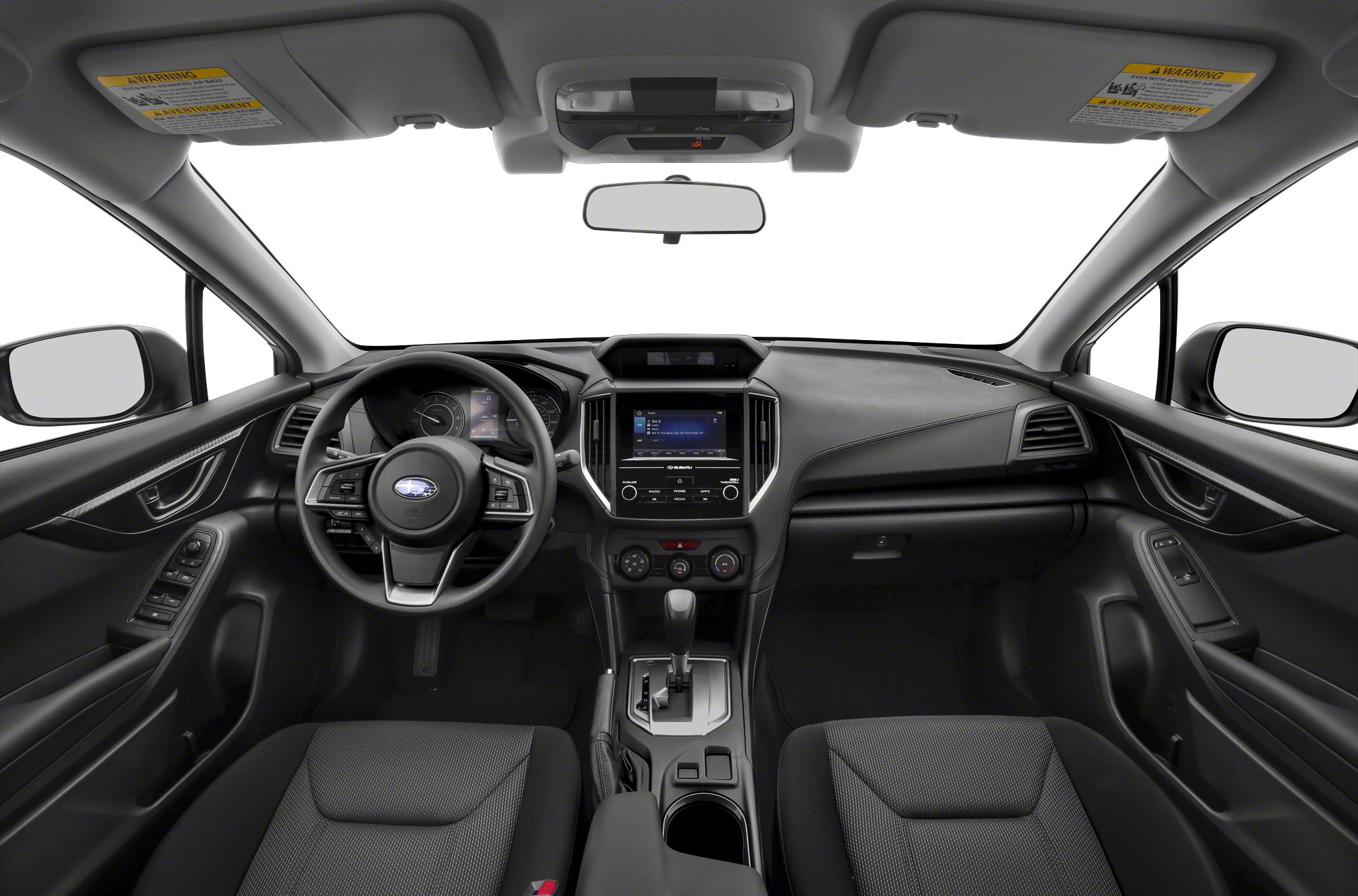 Dashboard, steering wheel, and center console of a hatchback interior