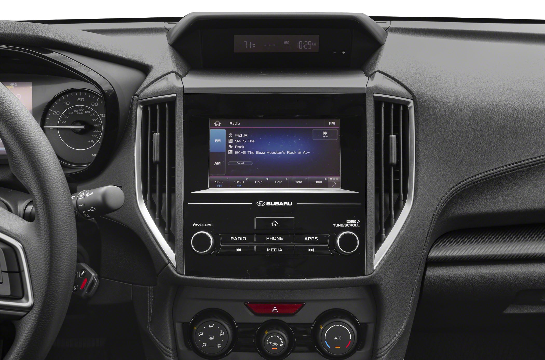 Central multimedia touchscreen and climate control knobs