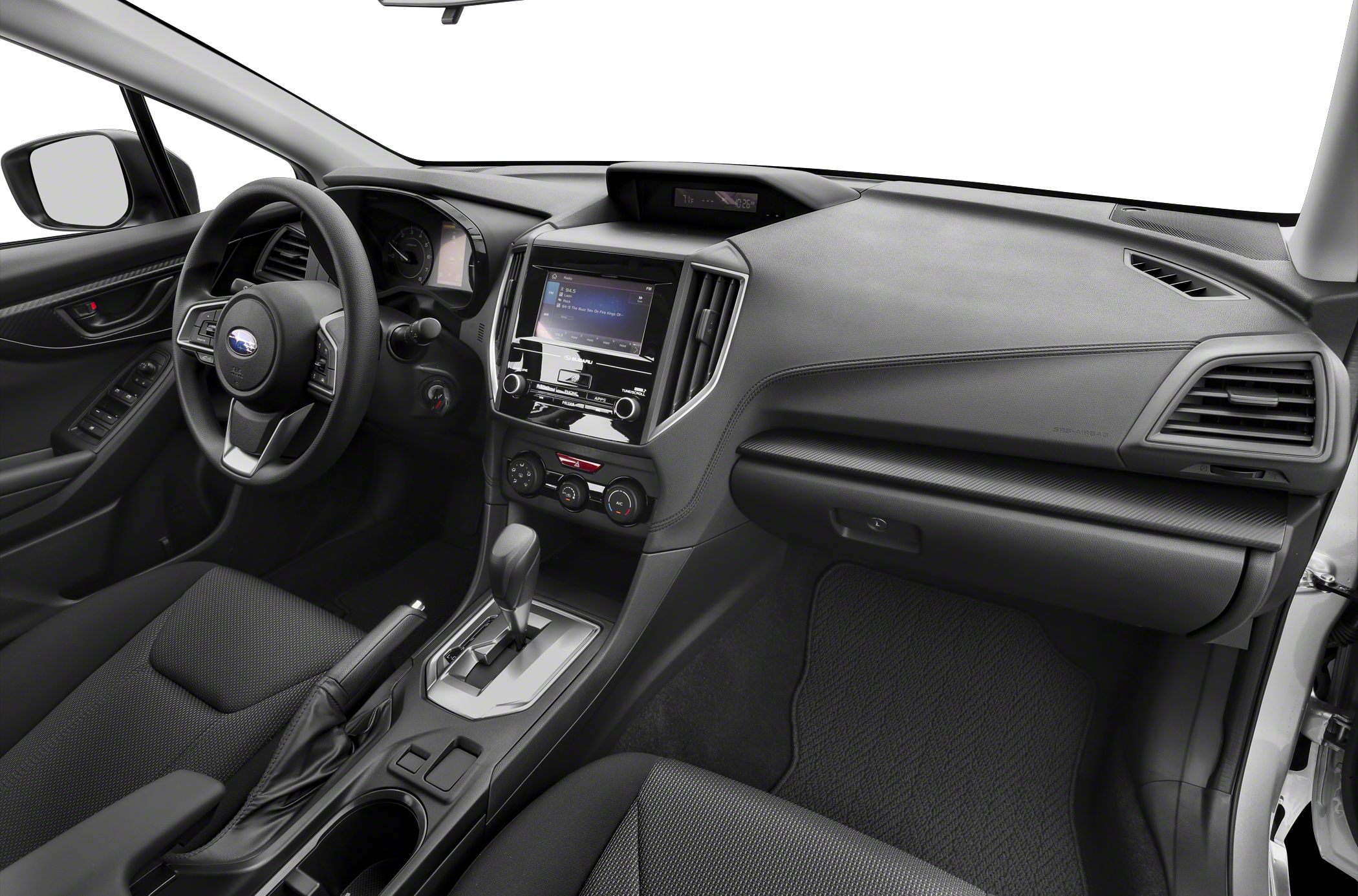 Dashboard, touchscreen, steering wheel, and center console in a modern hatchback interior