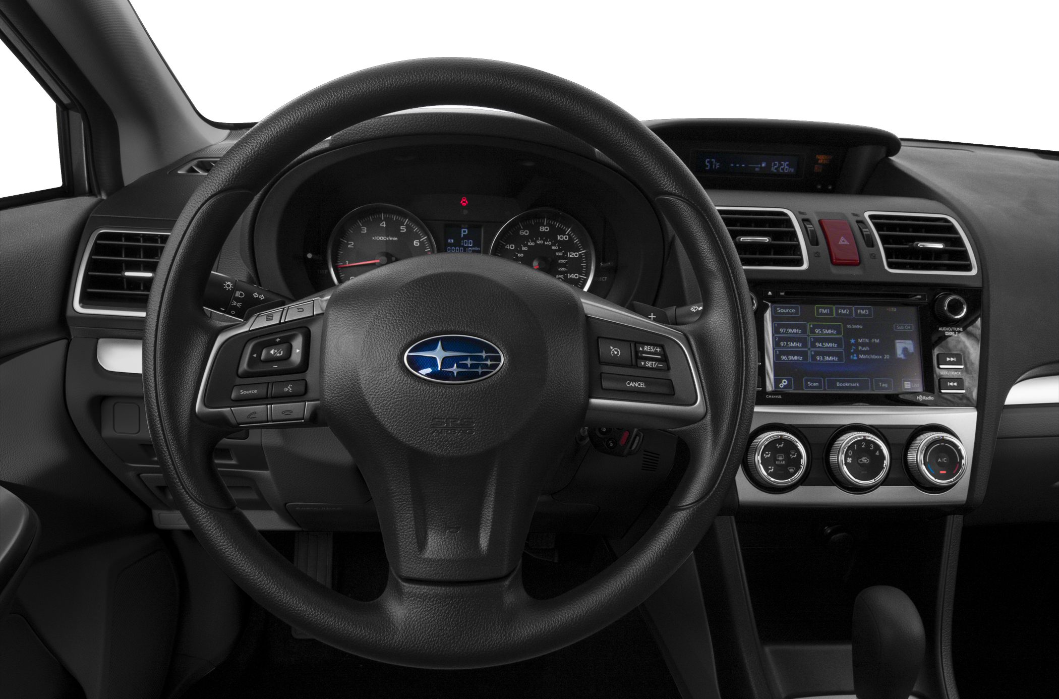 Steering wheel with controls, instrument cluster, and center console infotainment