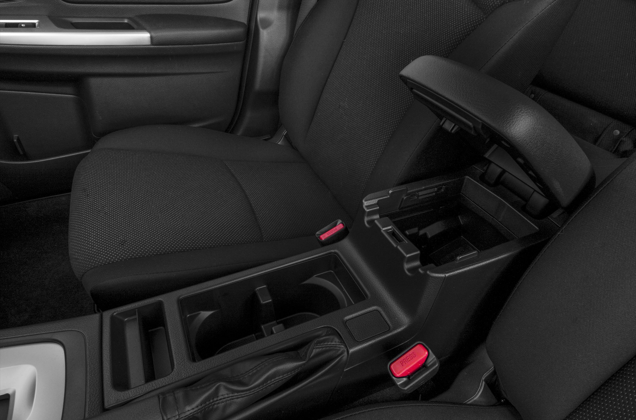 Center console storage and seatbelt buckles in car interior